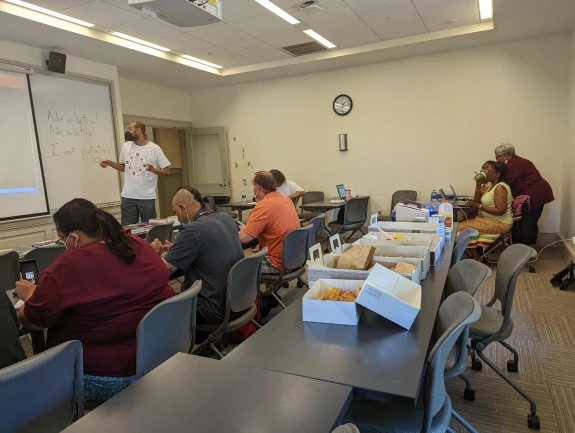 Corey Roberts teaching a language class.