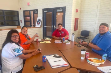 Mosiah Bluecloud and community members.