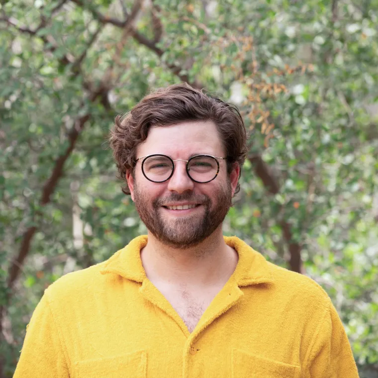 Robert Henderson in a yellow shirt